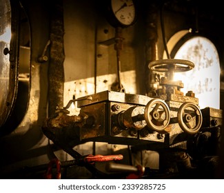 Trains – The cockpit of an old train. Warm light shines into the driver's cab of the old locomotive. There are no people to be seen. The machine stands still.