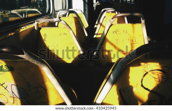 The tram car\
interior. Shadows on a sunny\
day.