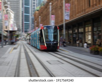 Tram moving through George St in Sydney NSW Australia