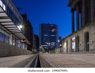 Tram Stop At Night Birmingham City 31.5.2021 Centre During Blue Hour With Modern Tower Block Skyscrapers. Low Dramatic Angle With Tramway Tracks In View To Diminishing Perspective. Old And New.