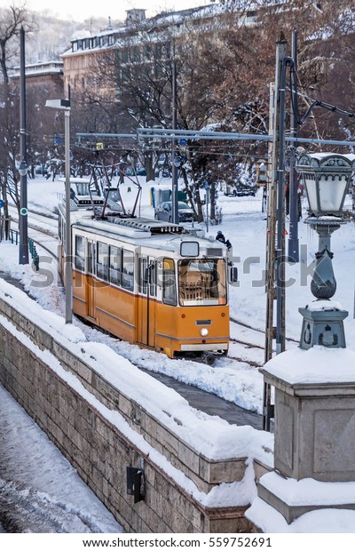 Tram and tramlines in\
Budapest at winter