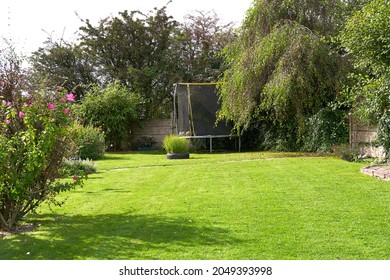 Trampoline In A Back Garden