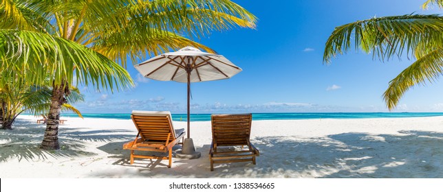 Tranquil Beach Scene. Panoramic Tropical Beach Landscape For Background Or Wallpaper, Two Lounge Chairs With Umbrella. Design Of Summer Vacation Holiday Concept