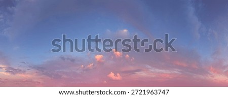 A tranquil cloudscape at sunset with warm tones and gentle clouds over the horizon, Cloudscape.