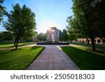 Tranquil Fountain Monument in Sunlit Park Eye Level View