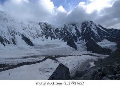 Tranquil Lake With Lush Green Forest, Snow-Capped Mountain, Blue Sky And White Clouds - Powered by Shutterstock