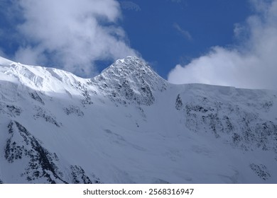 Tranquil Lake With Lush Green Forest, Snow-Capped Mountain, Blue Sky And White Clouds - Powered by Shutterstock