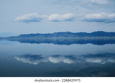 A Tranquil Lake With Reflections