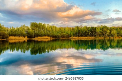 A tranquil lake surrounded by lush greenery, with vibrant water reflecting a dramatic sky a serene scene in nature - Powered by Shutterstock