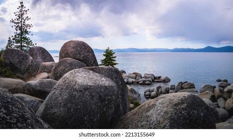 Tranquil Lake Tahoe With Glacial Rocks And Boulders In Sand Harbor In Nevada