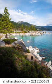 Tranquil Lake Tahoe With Glacial Rocks And Boulders With Mountain Views In Sand Harbor In Nevada