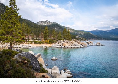 Tranquil Lake Tahoe With Glacial Rocks And Boulders With Mountain Views In Sand Harbor In Nevada