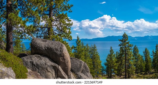 Tranquil Lake Tahoe landscape with pine trees, clean blue water, dramatic clouds, and glacial rocks and boulders in Logan Shoals Vista Point in Nevada - Shutterstock ID 2213697149