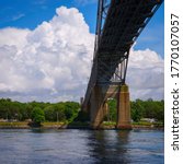 Tranquil landscape with dramatic white clouds over the Bourne Bridge on Cape Cod in Massachusetts, USA