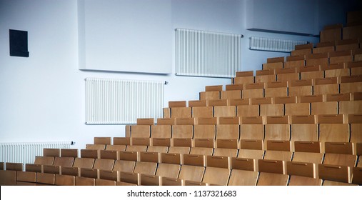 Tranquil Scene On The Subject Of Education, Studying, Business Or Movie Theater. Sloped Empty Auditorium, Lecture Hall, Classroom, Seminar Or Conference Space With Rounded / Fan Arrangement Of Seats. 