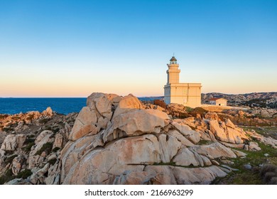 tranquil scenery with lighthouse at Capo Testa Sardinia at sunset. High quality photo