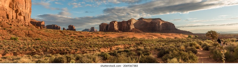 Tranquil Southwest Scene With Photographer In Monument Valley