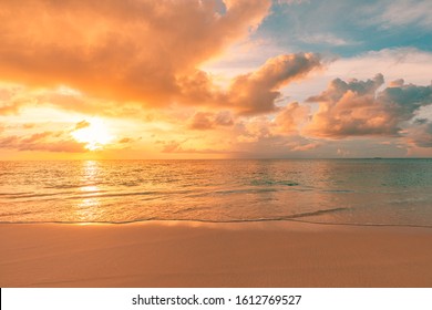 Tranquil sunset nature, sea sand sky clouds and horizon, panoramic banner view. Fantastic nature landscape, beautiful colors, wonderful scenery of tropical beach. Beach sunset, summer vacation - Shutterstock ID 1612769527