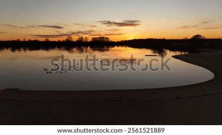 Similar – Image, Stock Photo Tranquil sunset over smooth water