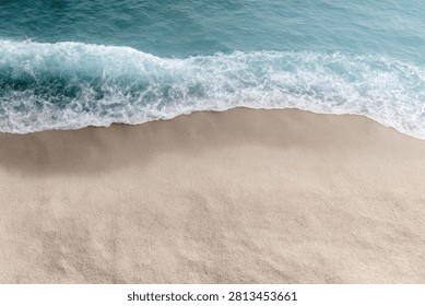 A tranquil top-down perspective of a sandy beach meeting the turquoise ocean, with soft waves creating a foamy edge.
