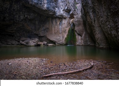 Tranquil water hole in a secluded cave like canyon, Emen, Bulgaria