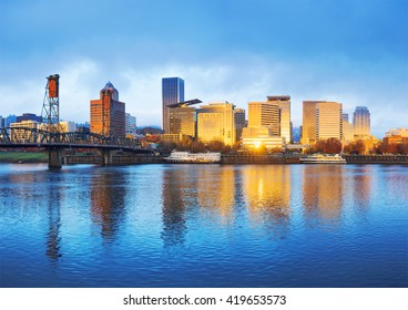 Tranquil Water,cityscape And Skyline Of Portland At Sunrise