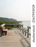 Tranquil Wooden Pier at Rice Lake State Park Overlooking Serene Waters