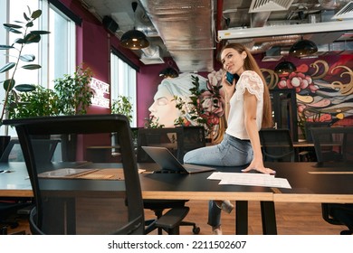 Tranquil Young Company Worker Making Phone Call