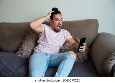 Trans Boy Made Up With A Gesture Of Surprise And Excitement When Seeing Something On The Mobile