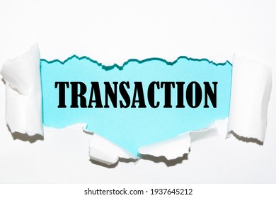 Transaction word written under torn paper. - Shutterstock ID 1937645212