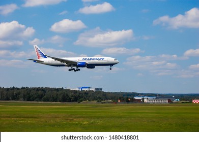 Transaero Airlines Boeing 777-200ER, Registration: EI-UNR. Manufacturer Serial Number: 28523, Is Landing In Moscow Sheremetyevo Airport. Moscow, Russia, June 1, 2012. 