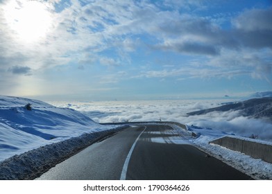Transalpina Road above the clouds. Winter Landscape