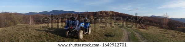 Transcarpathia, Ukraine - November 26, 2019:
CF Moto CFORCE 450 ATV blue 4x4. Quad motorbike. Extreme sport
motion, adventure, tourist
attraction.