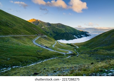 Transfagarasan highway, the most beautiful road in Europe, Romania.
Wonderful Carpathian mountain scenery. Selective focus on mountain road with perfect sunset.