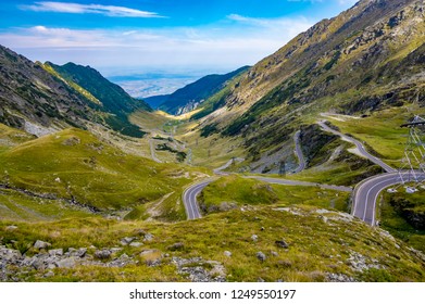 Transfagarasan pass. Crossing Carpathian mountains in Romania, Transfagarasan is one of the most spectacular mountain roads in the world. Wonderful mountain scenery.Mountain road with perfect blue sky