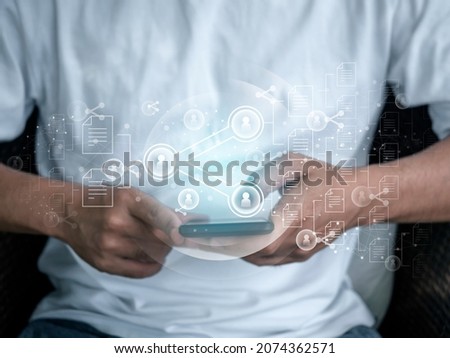 Transfer data concept. Share icon with many user and document icon symbol, digital virtual with man holding smartphone. Working anywhere. Mobile communication network concept. Digital transformation.