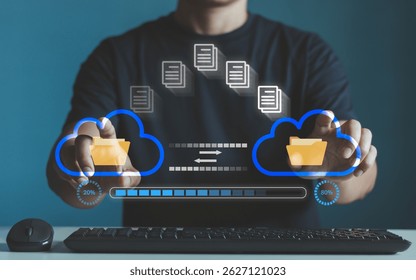 Transfer file business data backup system with internet cloud computing storage AI technology concept. Person hand using computer to download the document with a process loading bar on virtual screen. - Powered by Shutterstock - Get 15% off with code: PIKWIZARD15