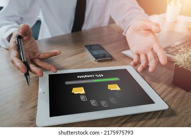 Transfer files data system relocation concept, Person hand using digital tablet waiting for transfer file process with loading bar icon on virtual screen.
