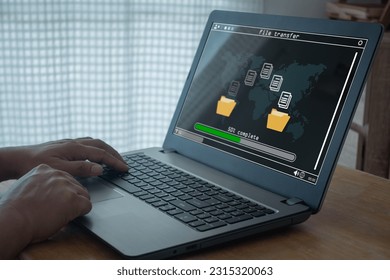 Transfer files data system relocation concept, Person hand using laptop computer waiting for transfer file process with loading bar icon on screen. Data transfer,  Backup data, Exchange file, DMS. - Powered by Shutterstock - Get 15% off with code: PIKWIZARD15