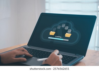Transfer files data system relocation cloud technology concept. Backup, exchange, share. Person hand using laptop computer waiting for transfer file process with loading bar icon on virtual screen. - Powered by Shutterstock - Get 15% off with code: PIKWIZARD15