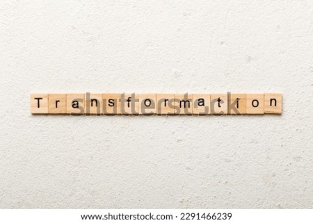 transformation word written on wood block. transformation text on table, concept.