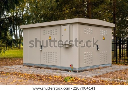 Transformer vault .Outdoor electric high voltage distribution cabinet in a park.
