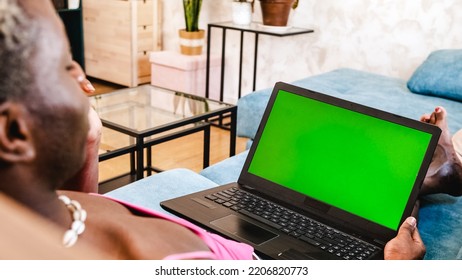 Transgender Black Person Making Video Call With Green Screen On Laptop At Home