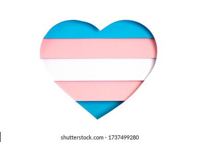 Transgender flag in the form of paper cut out shape with blue, pink and white colors. Love, pride, diversity, tolerance, equality idea
