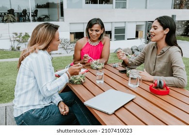 Transgender Latin Business Woman Middle Age And Colleagues Eating Salad At The Office Terrace In Mexico Latin America