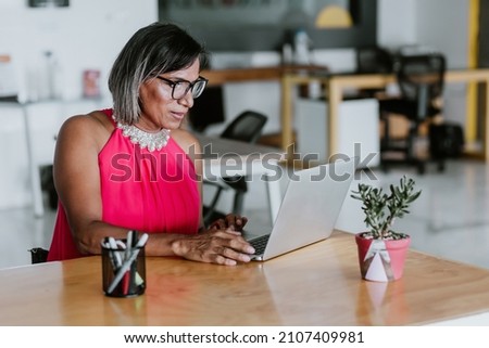 transgender latin woman working with computer at the office in Mexico Latin America Foto stock © 