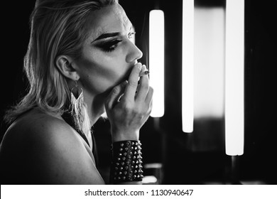 Transgender Woman Smoking In A Room