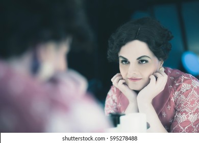 Transgender Woman Vintage 1920s Fashion Looking In Mirror.