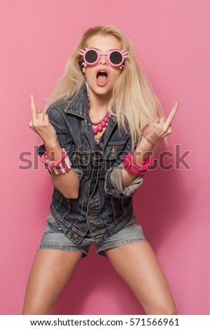 Transgressive pop girl portrait wearing odd sunglasses