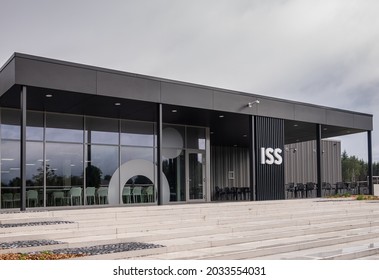 Transinne, Wallonia, Belgium - August 10, 2021: Euro Space Center. ISS, International Space Station Logo On Black Building Under Rainy Sky.